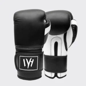 MAYHM Premium Boxing Gloves in black and white featuring multi-layer foam padding, secure wrist support, and premium construction for boxing training, sparring, and bag work.