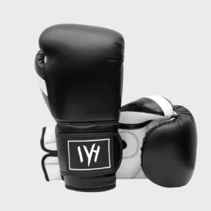 MAYHM black and white training boxing gloves with hook-and-loop wrist closure for boxing, fitness training, bag work, and sparring.